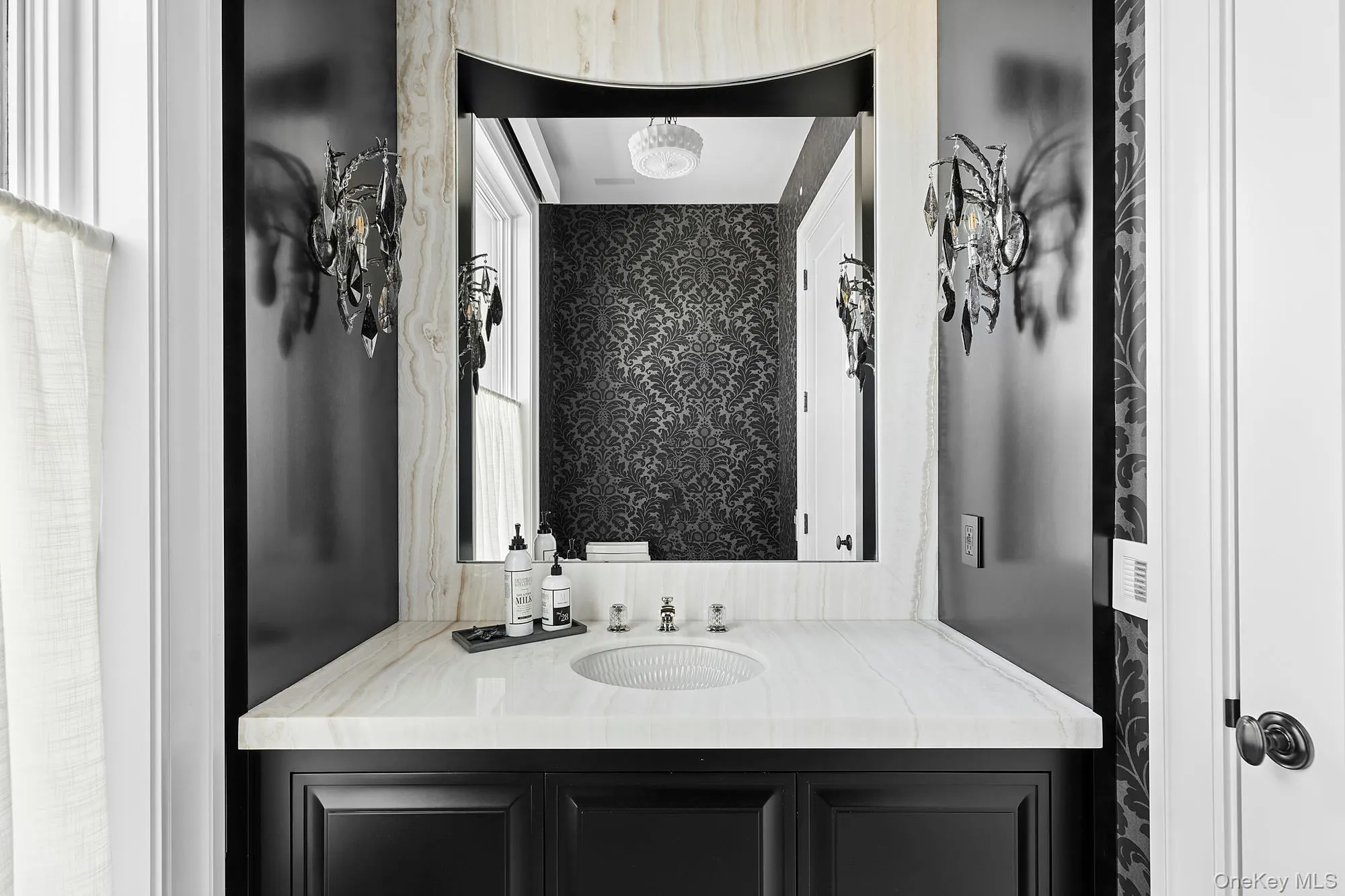 Bathroom featuring vanity Bathroom featuring vanity