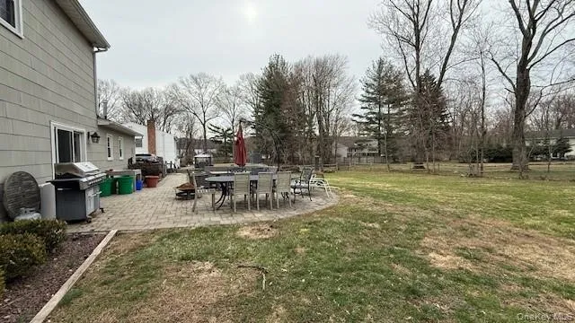 Large back patio and back yard area Large back patio and back yard area