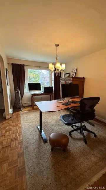 Formal dining room temporarily being used as office Formal dining room temporarily being used as office