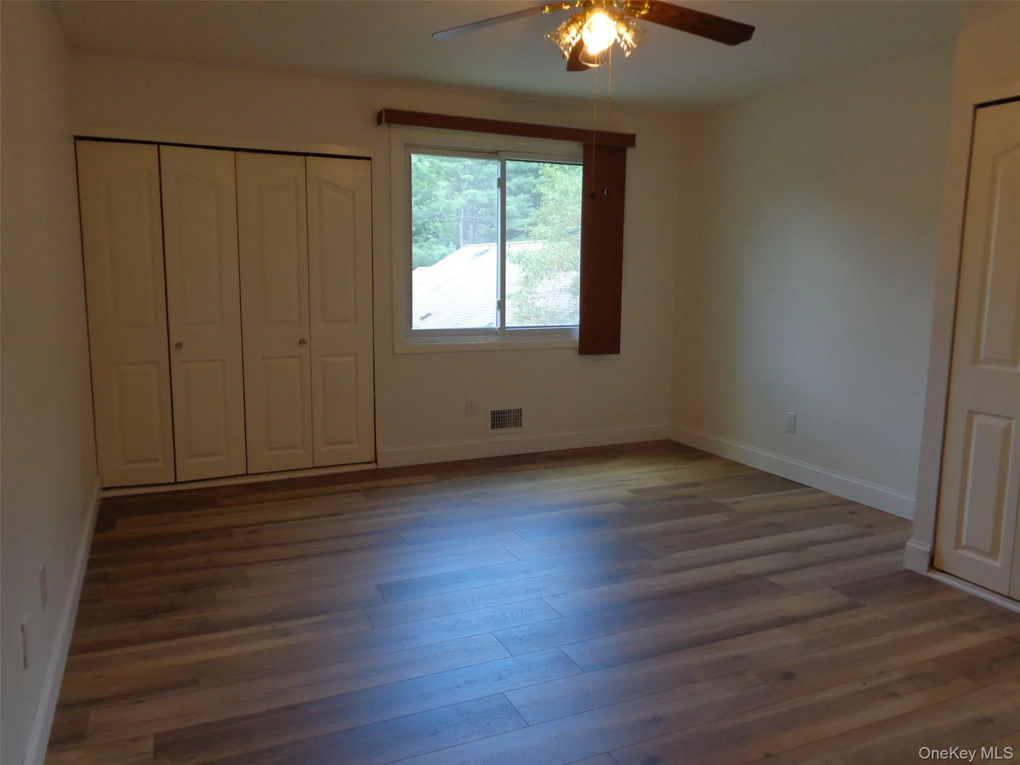 To the right there is also a single closet, also upgraded with adjustable shelving. To the right there is also a single closet, also upgraded with adjustable shelving.