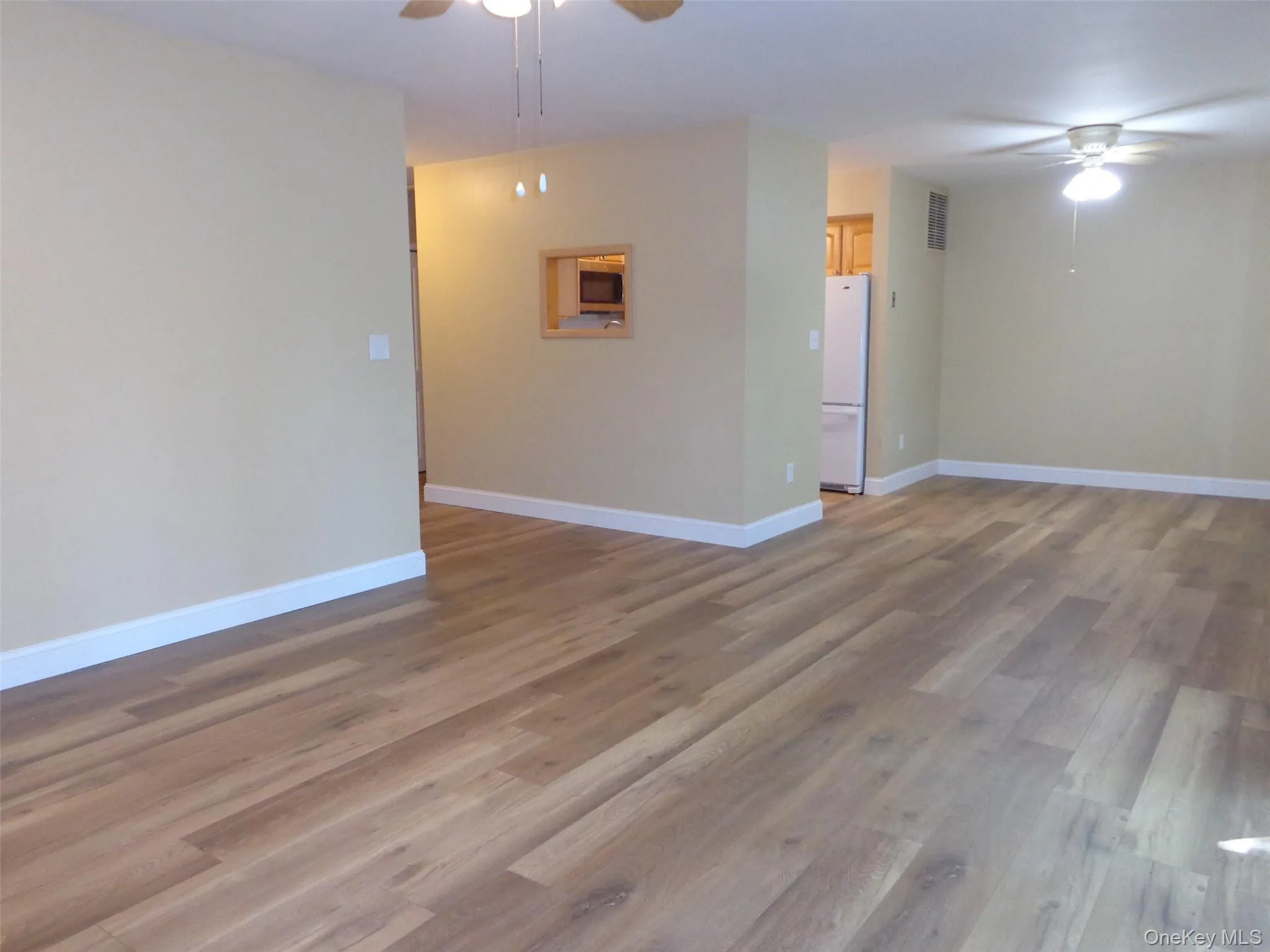 View from living room into dining room. View from living room into dining room.