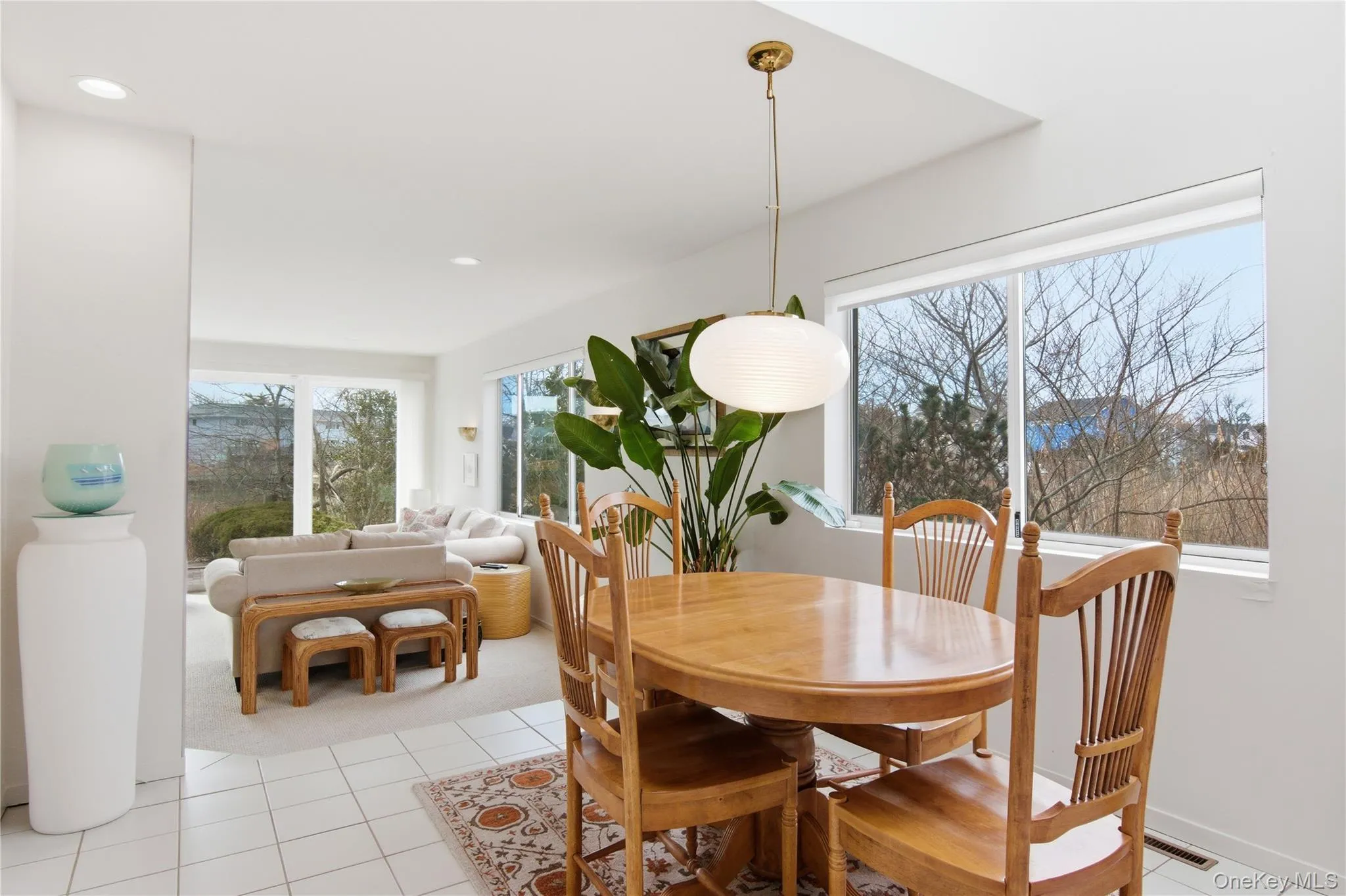 Dining room featuring light tile patterned floors Dining room featuring light tile patterned floors
