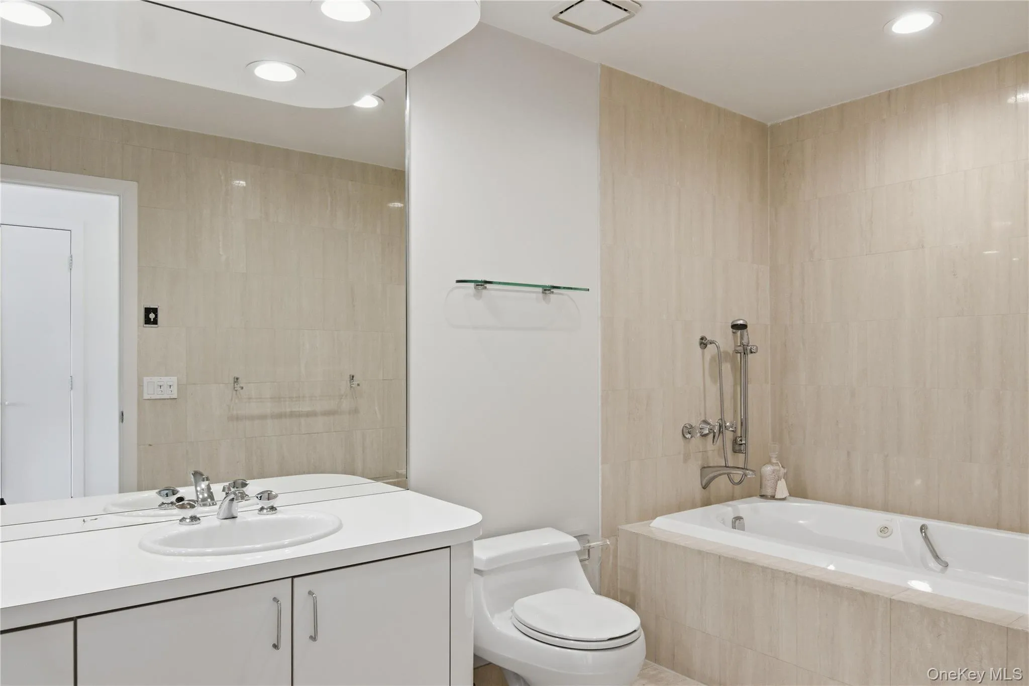 Full bathroom with vanity and recessed lighting Full bathroom with vanity and recessed lighting