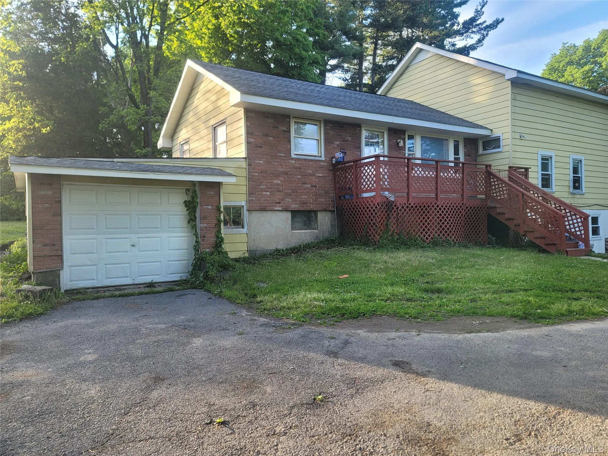 Exterior featuring brick and siding finishes Exterior featuring brick and siding finishes