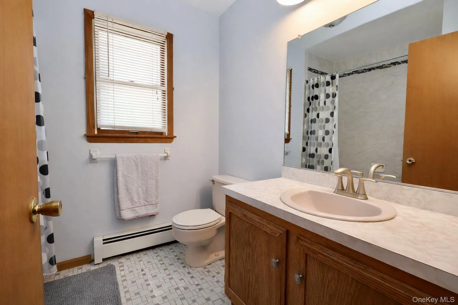 Upgraded tile surround Upgraded tile surround
