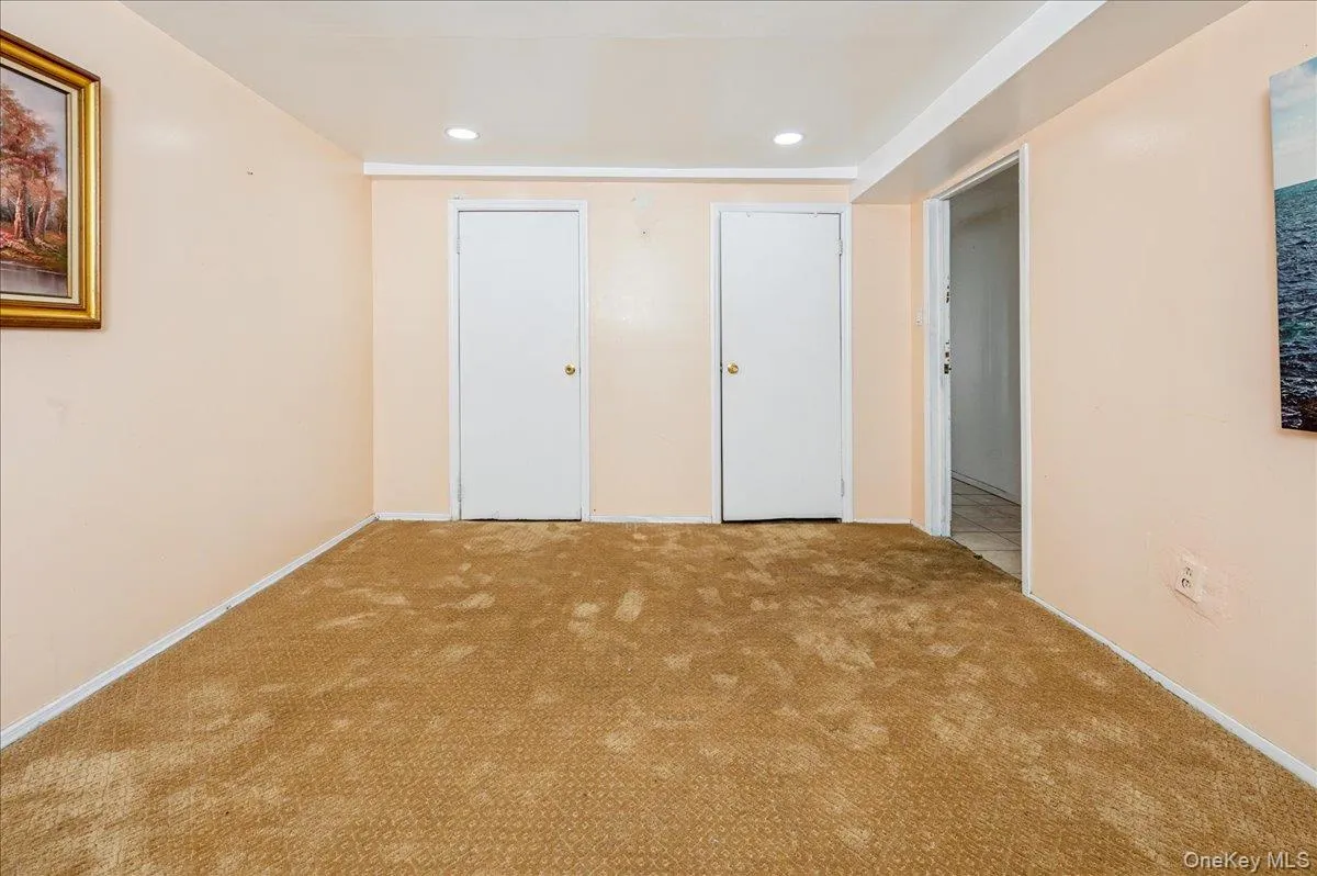 Carpeted third bedroom (on first floor) Carpeted third bedroom (on first floor)