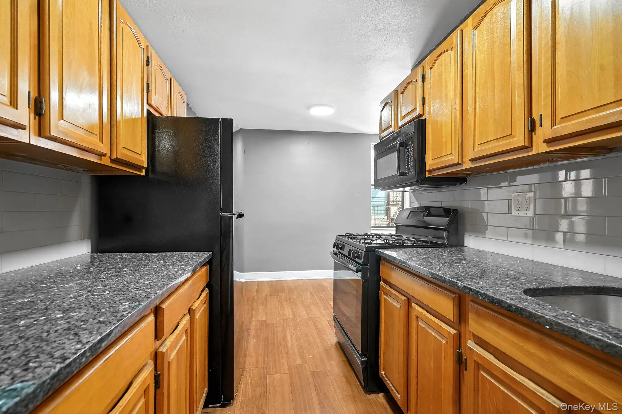 Dine-in kitchen featuring granite counter tops Dine-in kitchen featuring granite counter tops