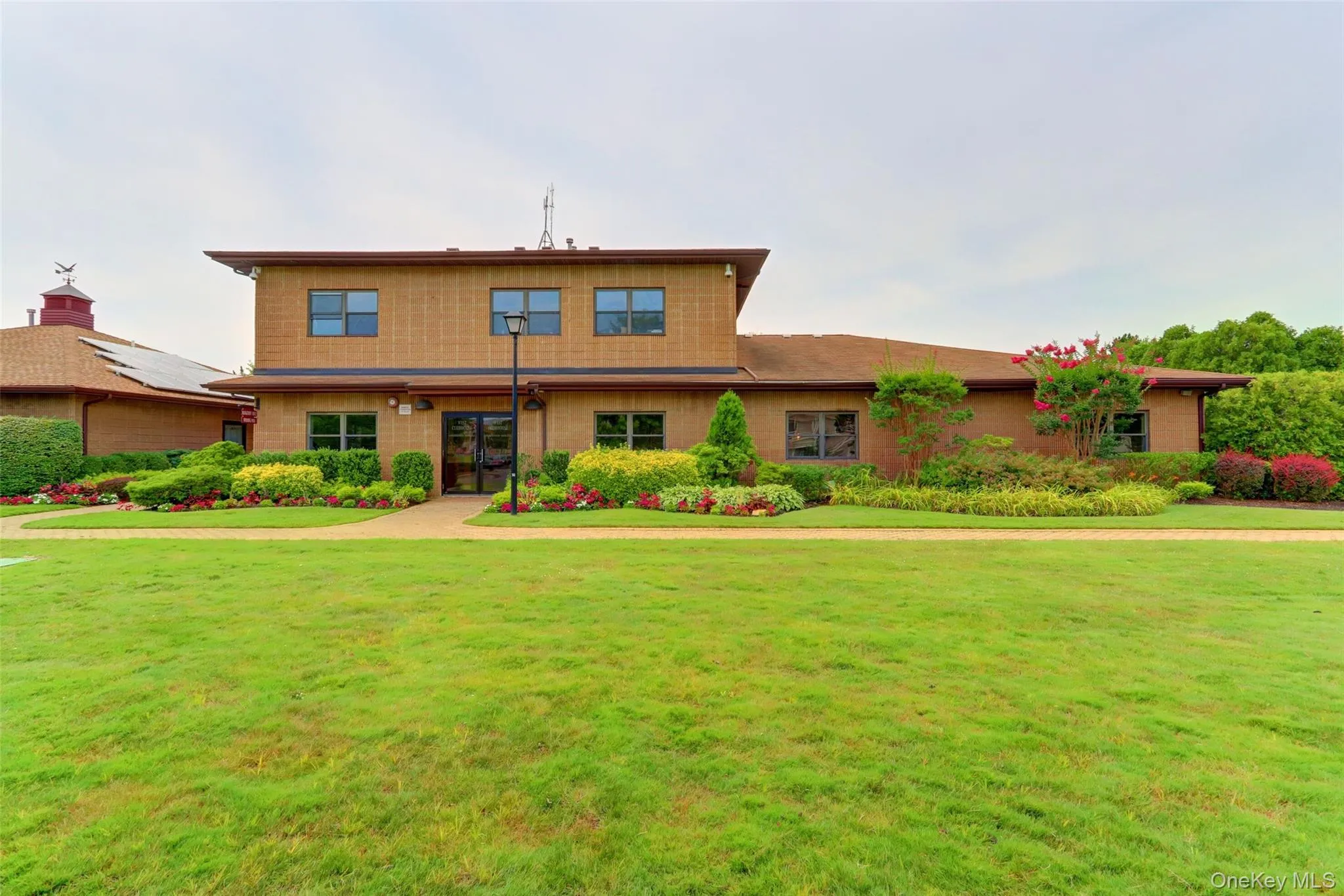 View of front of property featuring a front lawn View of front of property featuring a front lawn