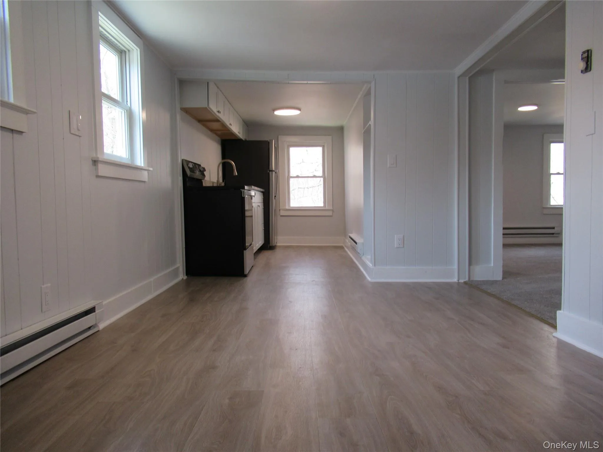 Large Dining Area looking into the Kitchen Large Dining Area looking into the Kitchen