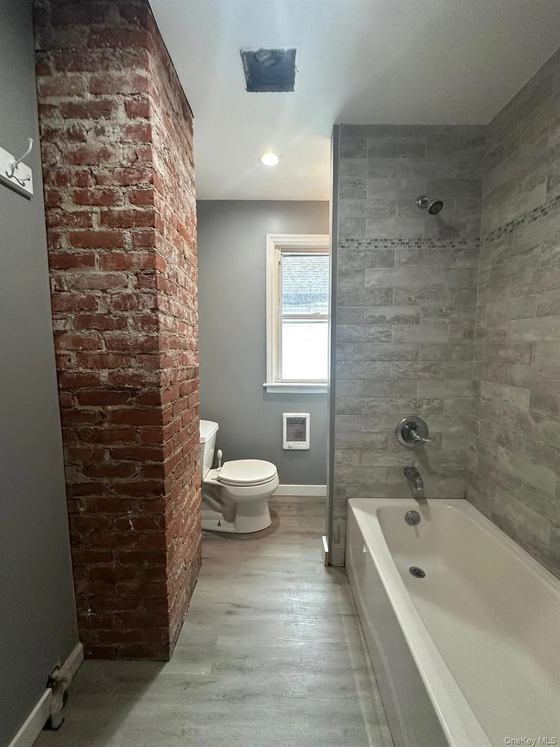Full bathroom nicely renovated with beautiful tile wall in tub area. Full bathroom nicely renovated with beautiful tile wall in tub area.
