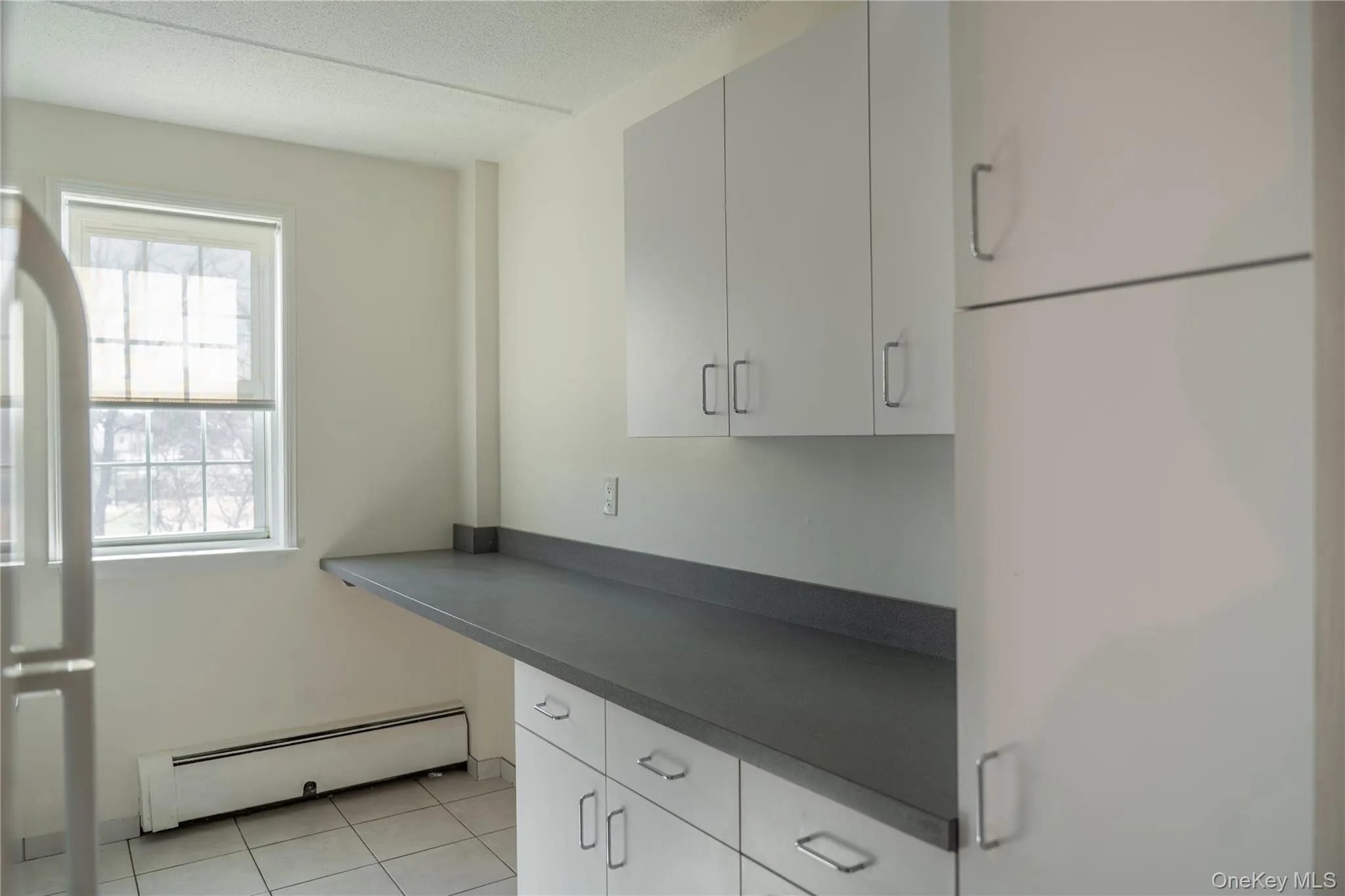 Another view of the kitchen offering an eating area for 2 Another view of the kitchen offering an eating area for 2