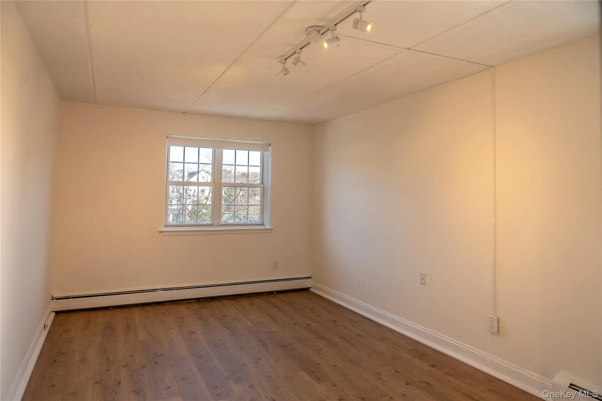 Another view of the bedroom showing its Eastern exposure Another view of the bedroom showing its Eastern exposure