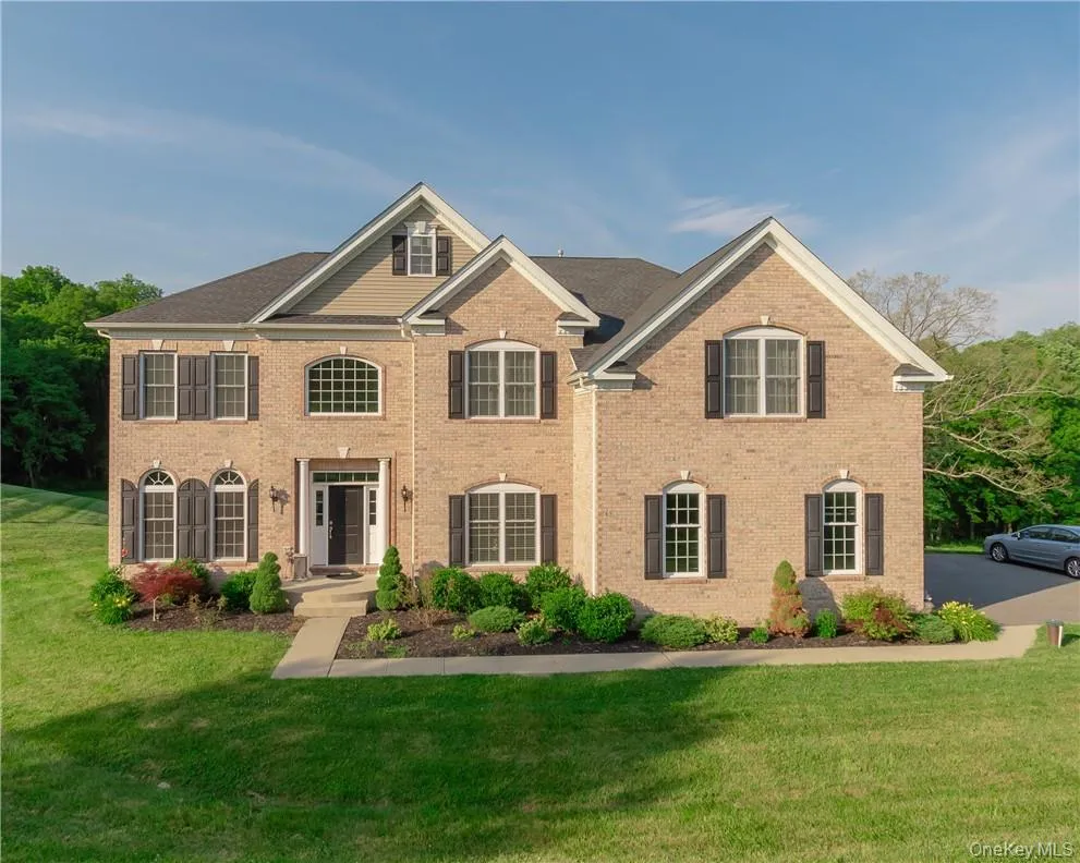 View of front of house featuring a front lawn View of front of house featuring a front lawn