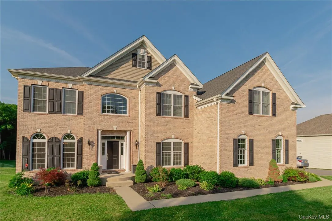 View of front of house featuring a front lawn View of front of house featuring a front lawn