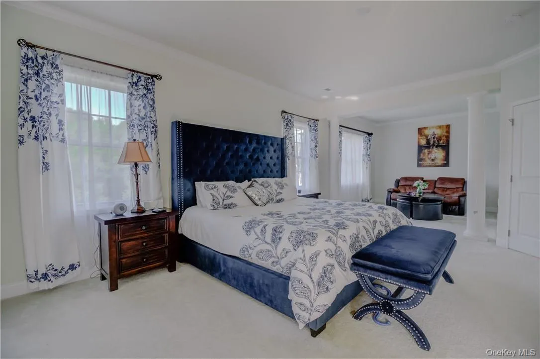 Master Bedroom with carpet and ornamental molding Master Bedroom with carpet and ornamental molding