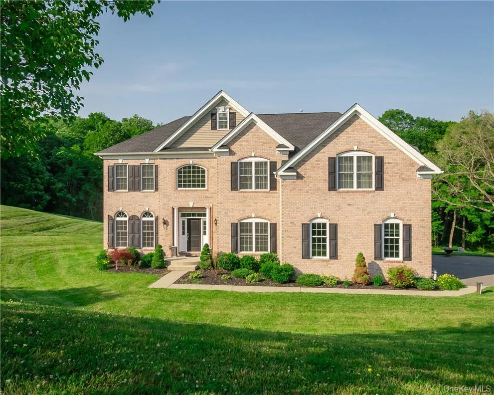 View of front of house with a front lawn View of front of house with a front lawn