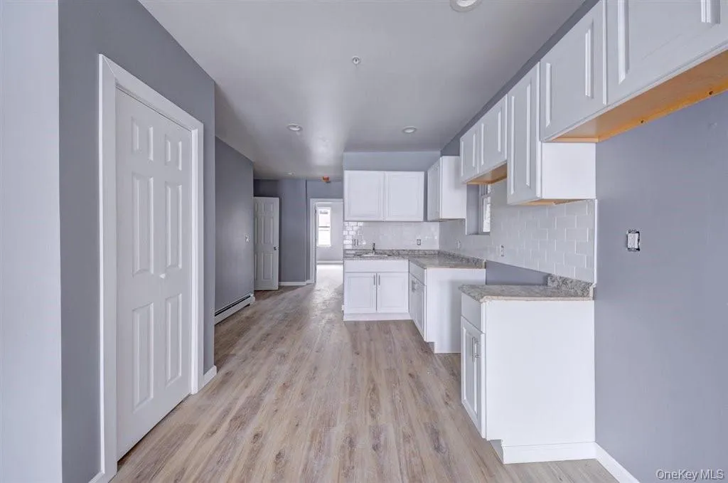 Kitchen Area looking towards Laundry room Kitchen Area looking towards Laundry room