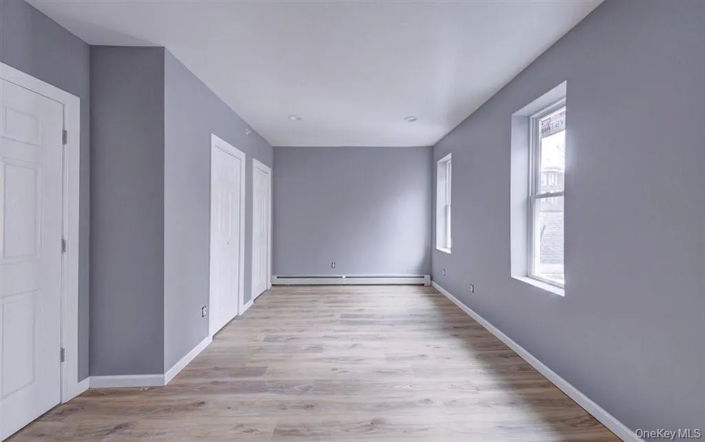 Huge Bedroom with Hardwood Floors and plenty of Sunlight. Also Double Closets Huge Bedroom with Hardwood Floors and plenty of Sunlight. Also Double Closets