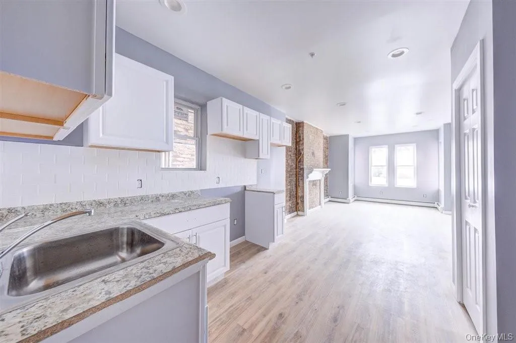 Kitchen looking towards Livingroom and Bonus Room. Kitchen looking towards Livingroom and Bonus Room.