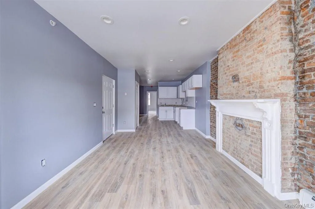 Livingroom area looking towards Kitchen Livingroom area looking towards Kitchen
