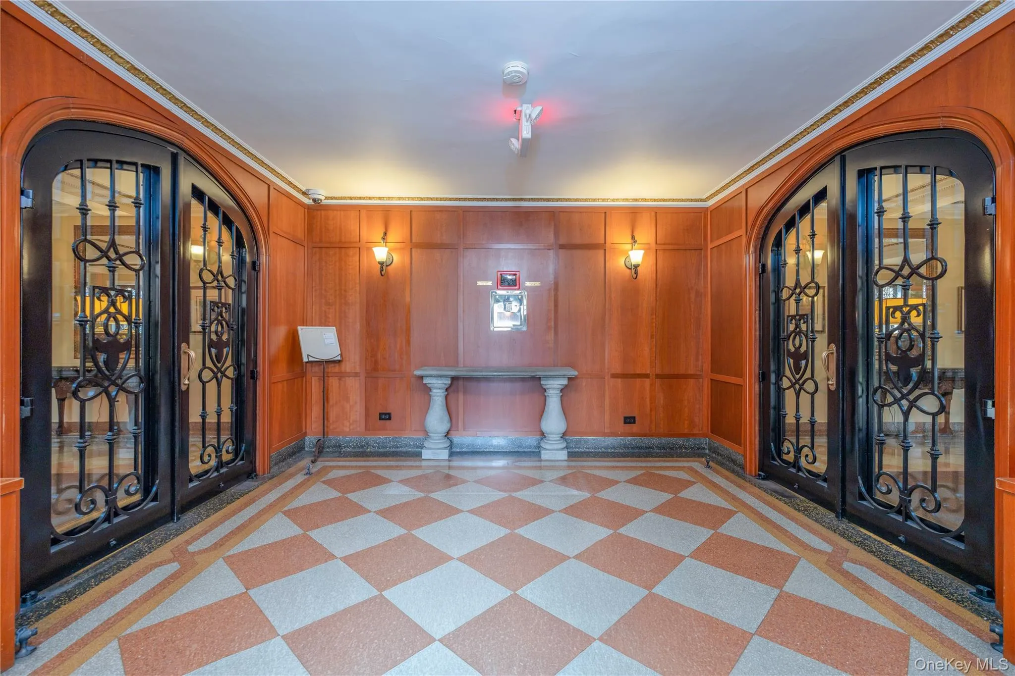 Iron lobby doors and impressive terrazzo floors Iron lobby doors and impressive terrazzo floors