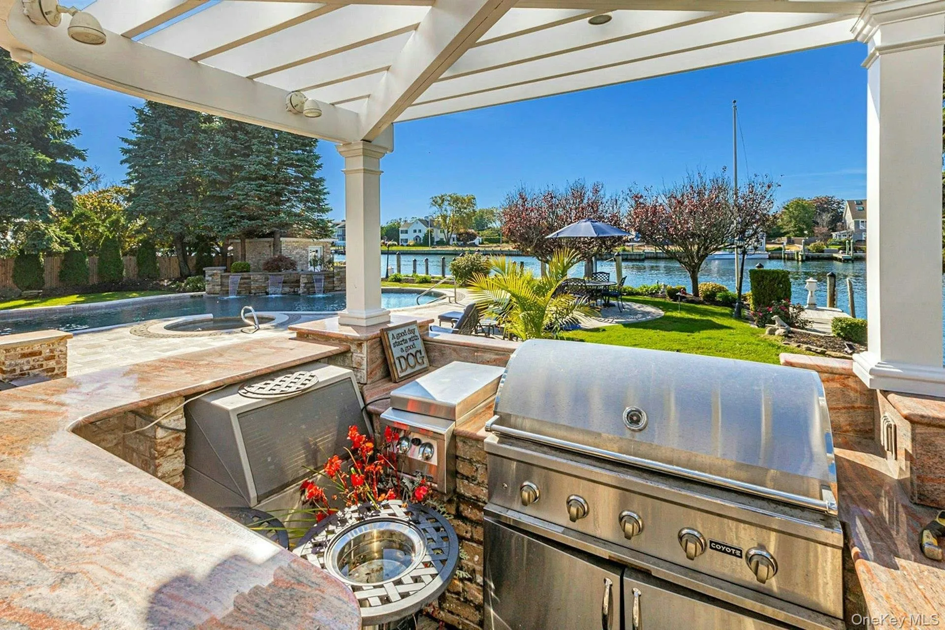 Outdoor kitchen with pergola and gas barbecue. Outdoor kitchen with pergola and gas barbecue.