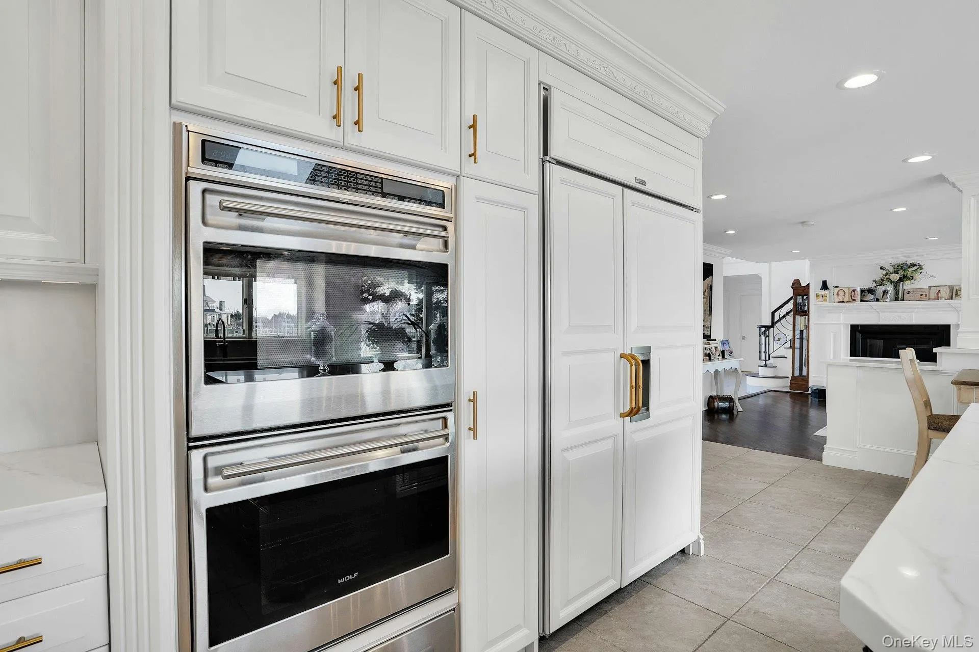 Wolf double ovens and Sub-zero, paneled refrigerator and freezer. Wolf double ovens and Sub-zero, paneled refrigerator and freezer.