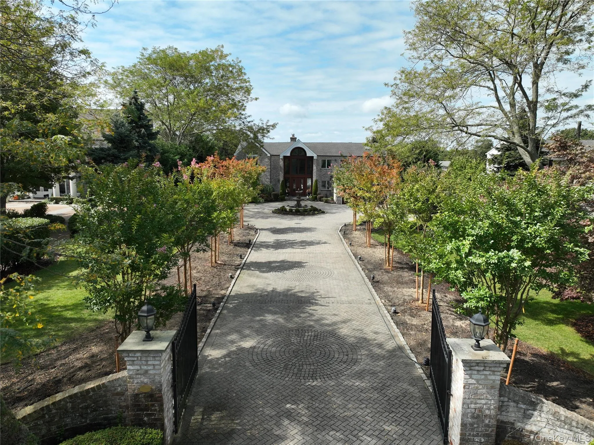 Magnificent tree lined driveway leading to this waterfront beauty. Magnificent tree lined driveway leading to this waterfront beauty.