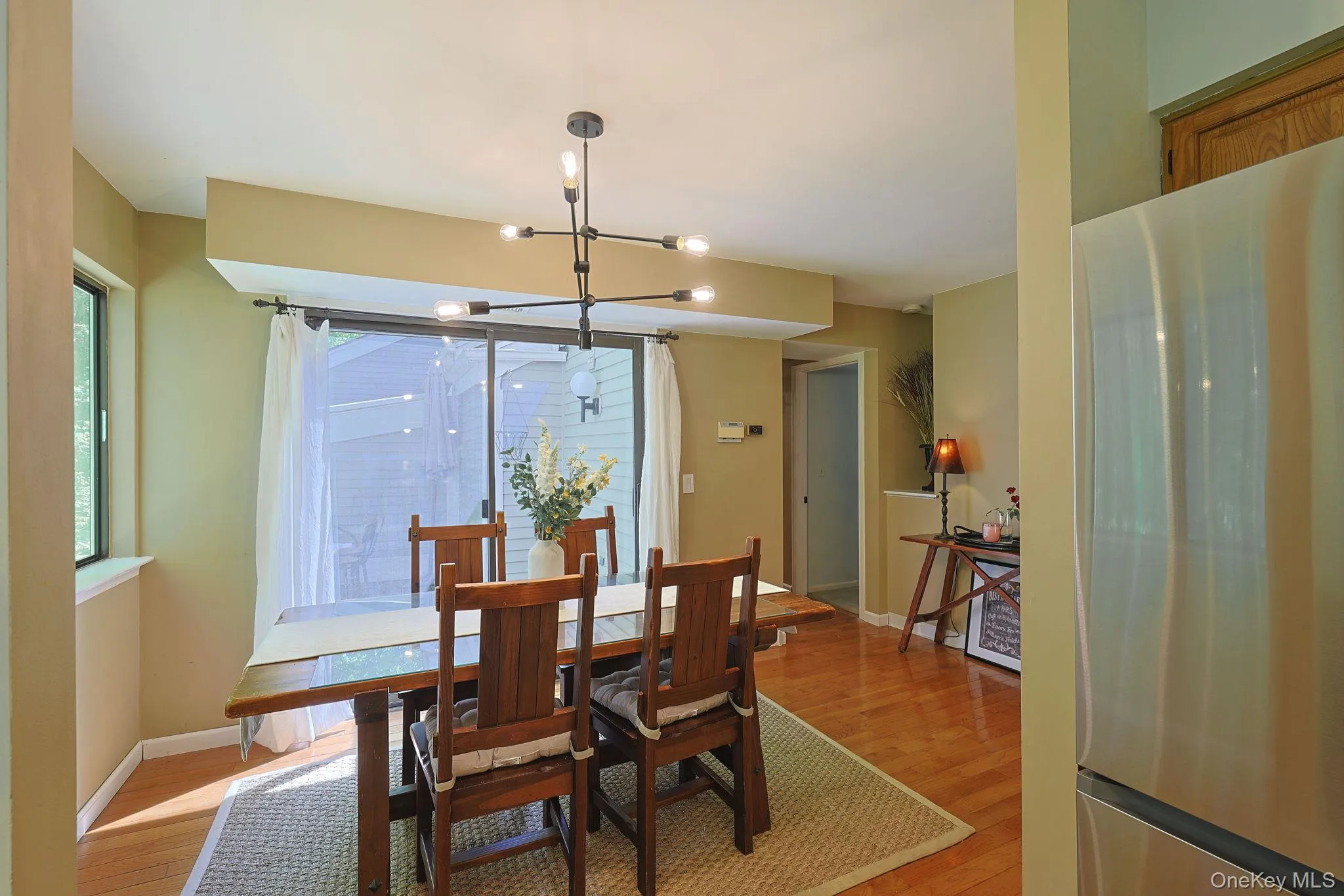 Dining area featuring plently of natural light Dining area featuring plently of natural light