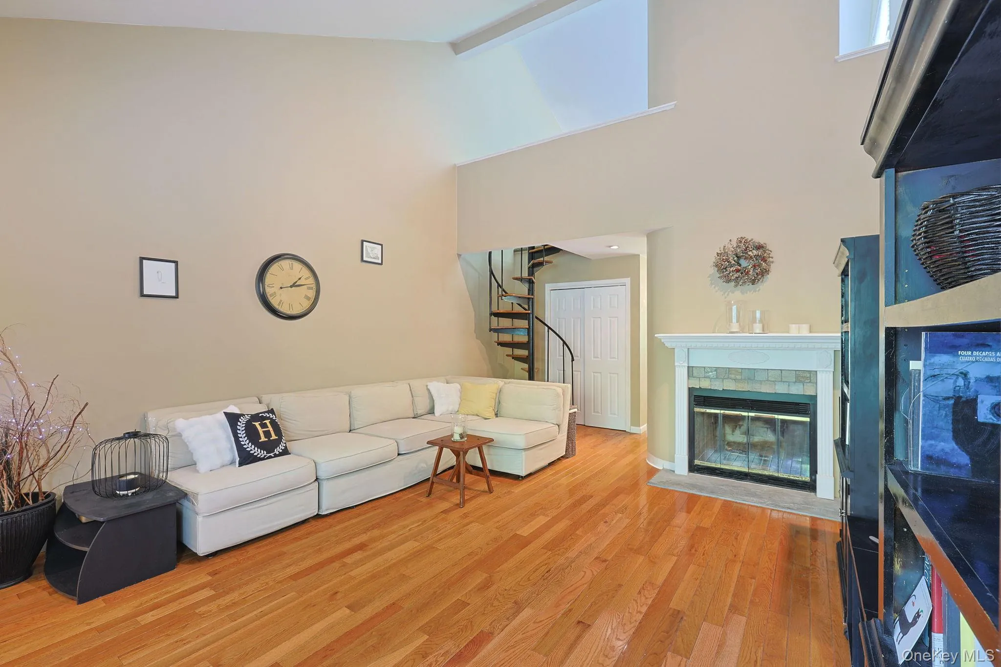 Living room featuring hardwood flooring, fireplace Living room featuring hardwood flooring, fireplace