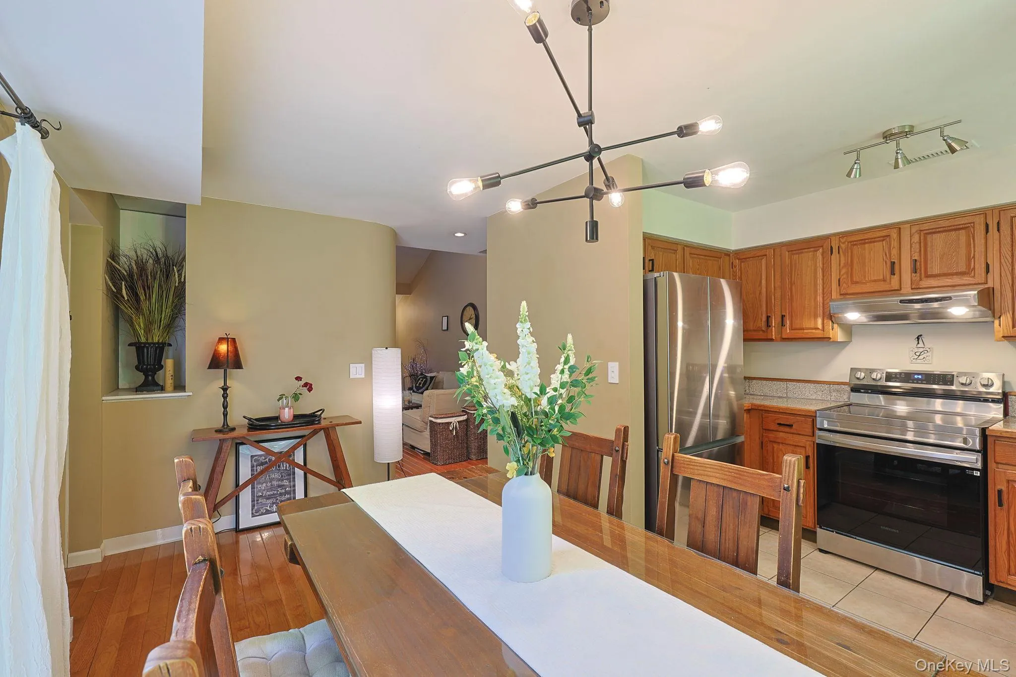Dining area located next to the kitchen with natural light Dining area located next to the kitchen with natural light