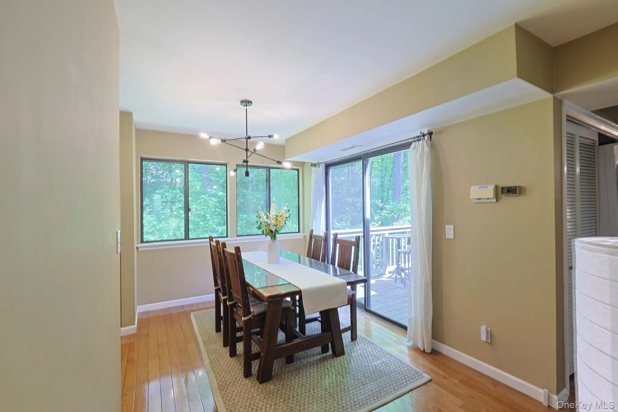 Dining area featuring access to the back deck Dining area featuring access to the back deck