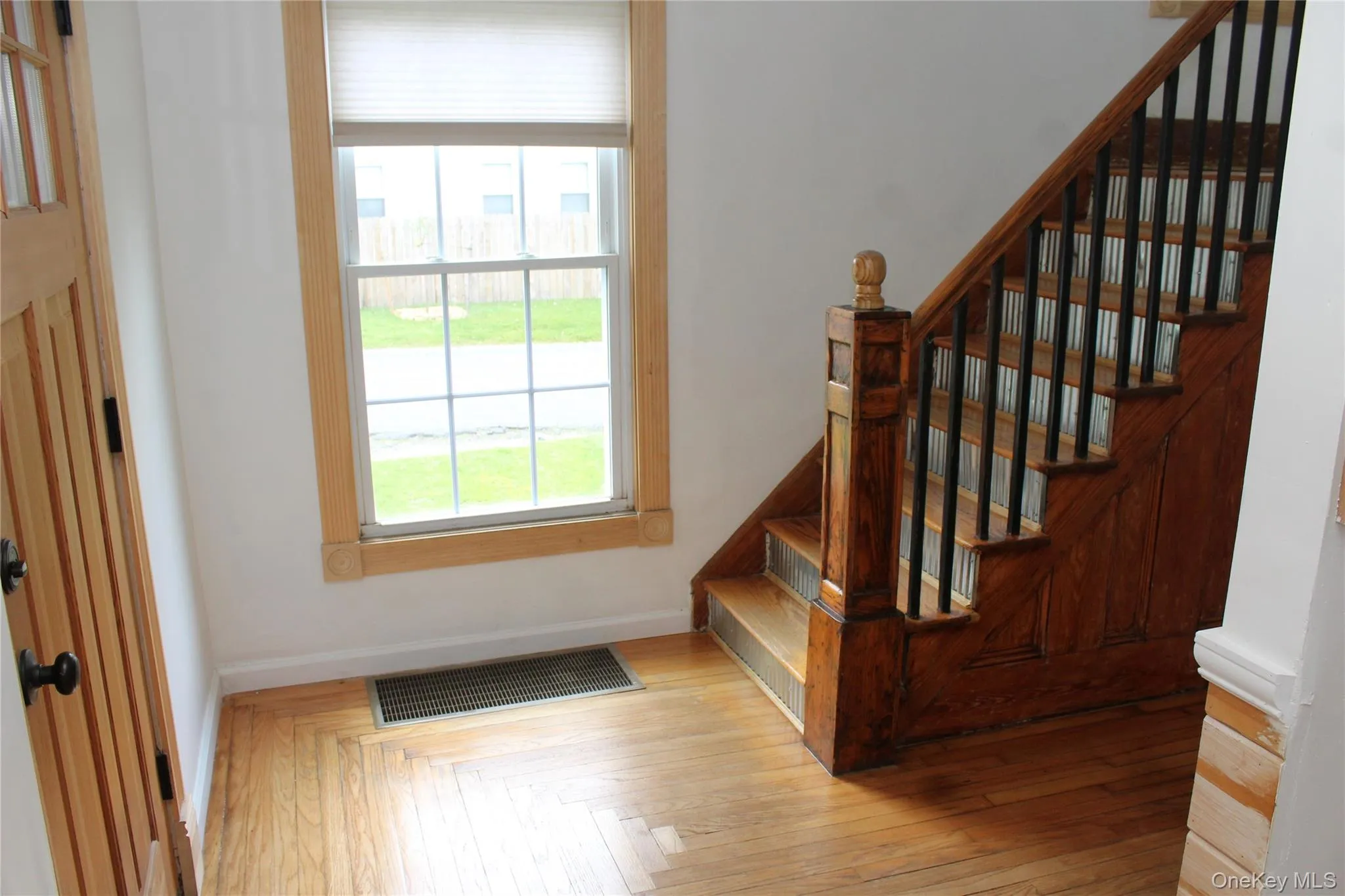 Front Hallway with stairs to second floor. Front Hallway with stairs to second floor.