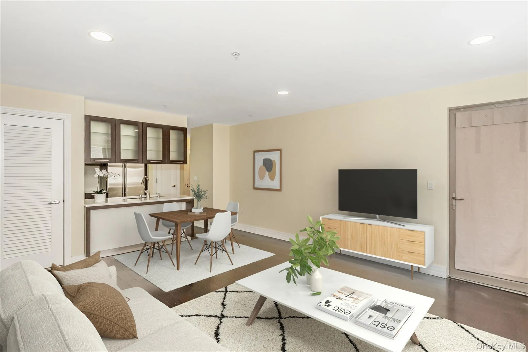 Living room with recessed lighting and wood finished floors Living room with recessed lighting and wood finished floors