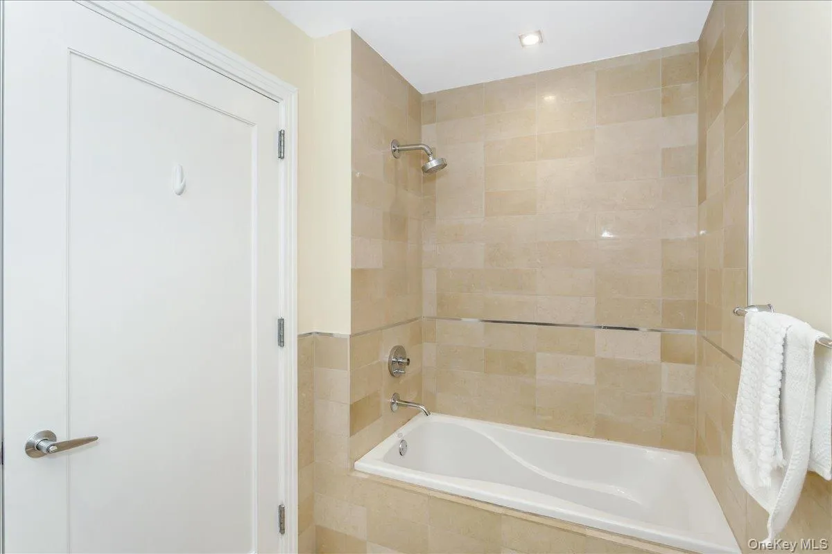 Full bath featuring tiled shower / bath Full bath featuring tiled shower / bath