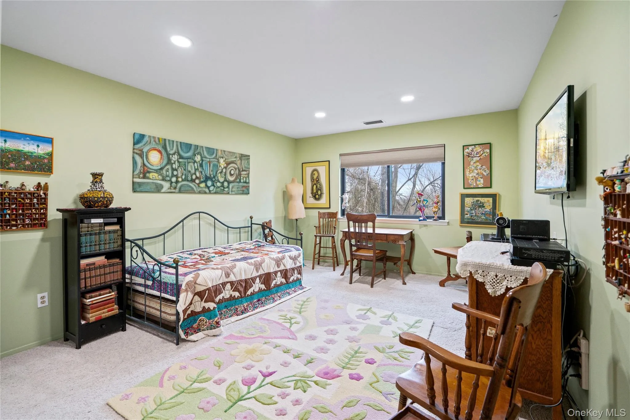 Bedroom with carpet floors and recessed lighting Bedroom with carpet floors and recessed lighting