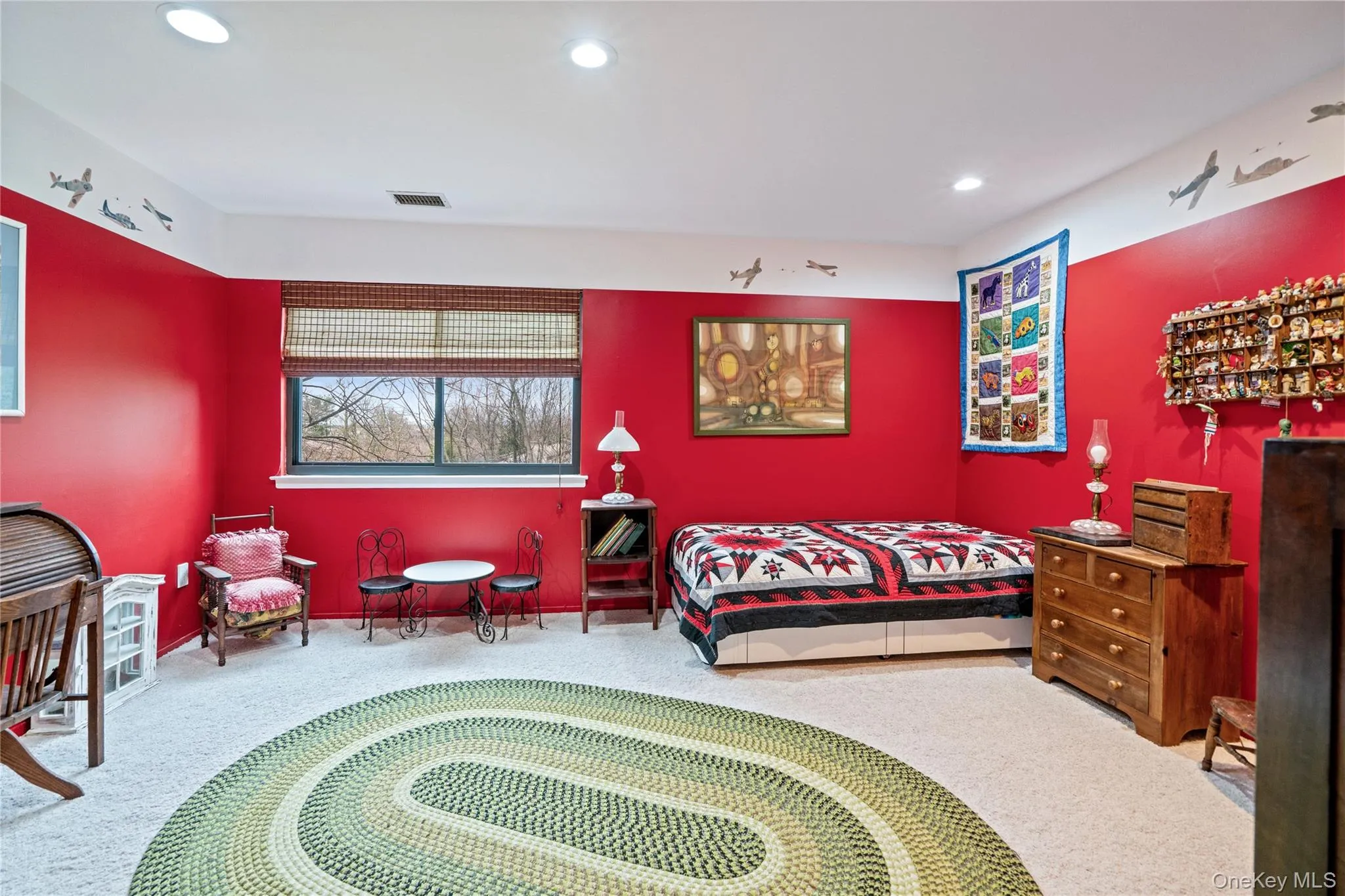 Bedroom featuring light colored carpet and recessed lighting Bedroom featuring light colored carpet and recessed lighting