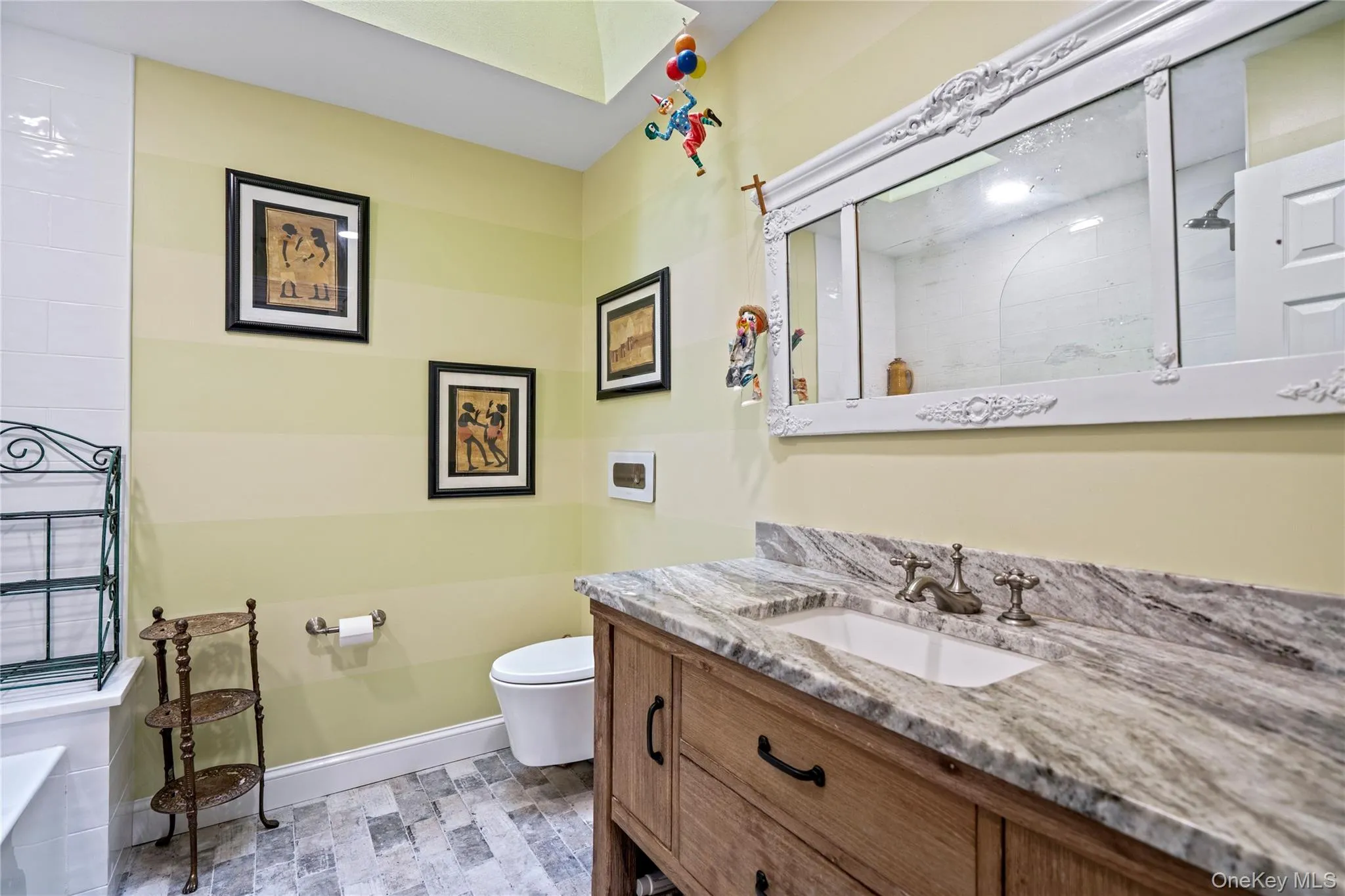 Full bathroom featuring vanity and a shower Full bathroom featuring vanity and a shower