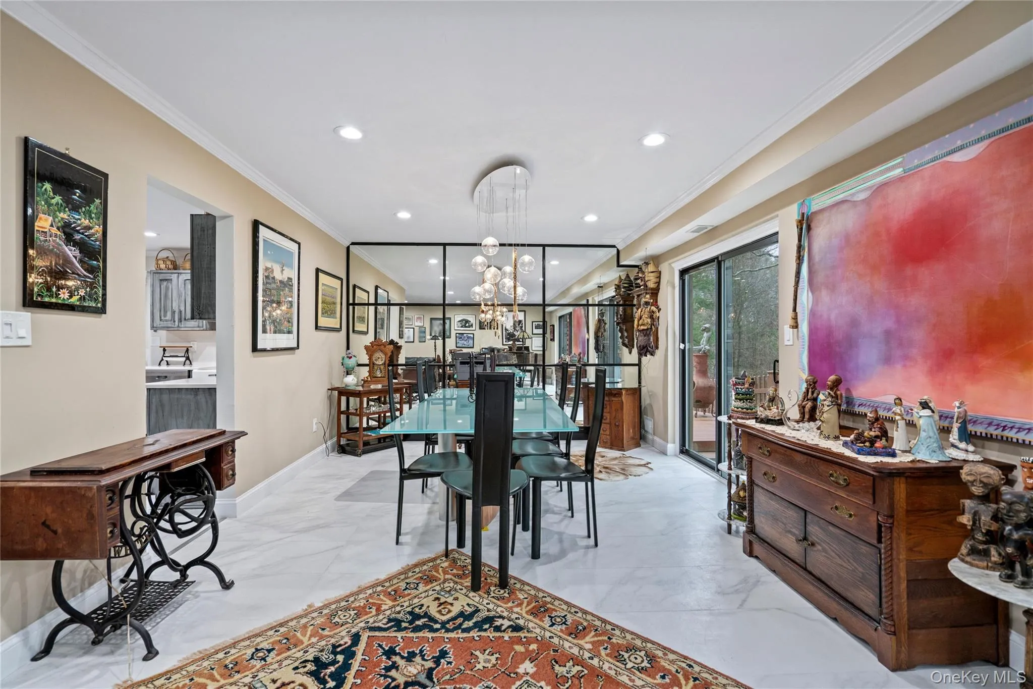 Dining room with ornamental molding and hanging lights Dining room with ornamental molding and hanging lights