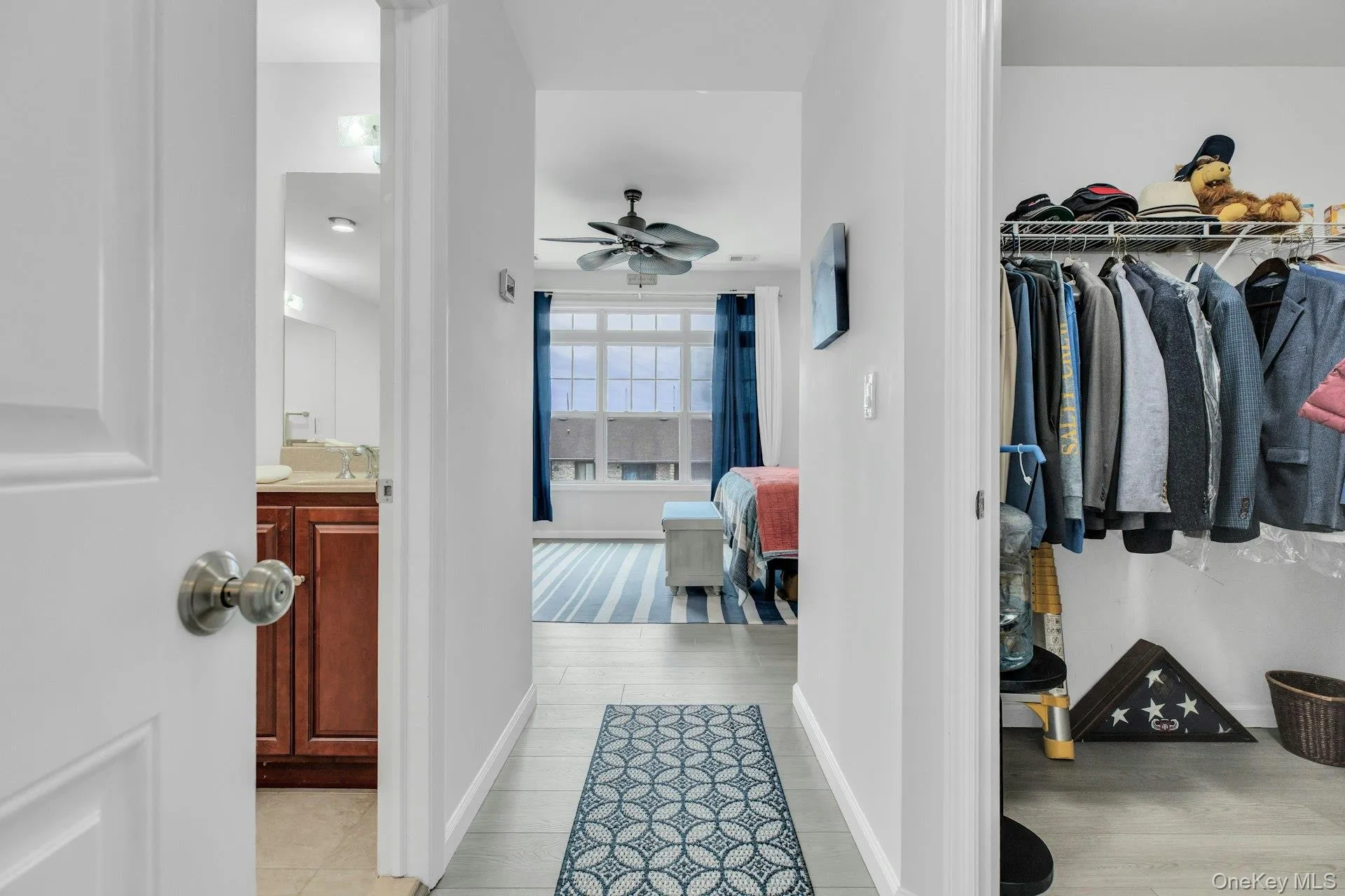Hall to Primary Bedroom w/Walk-in Closets and Full Bath. Hall to Primary Bedroom w/Walk-in Closets and Full Bath.