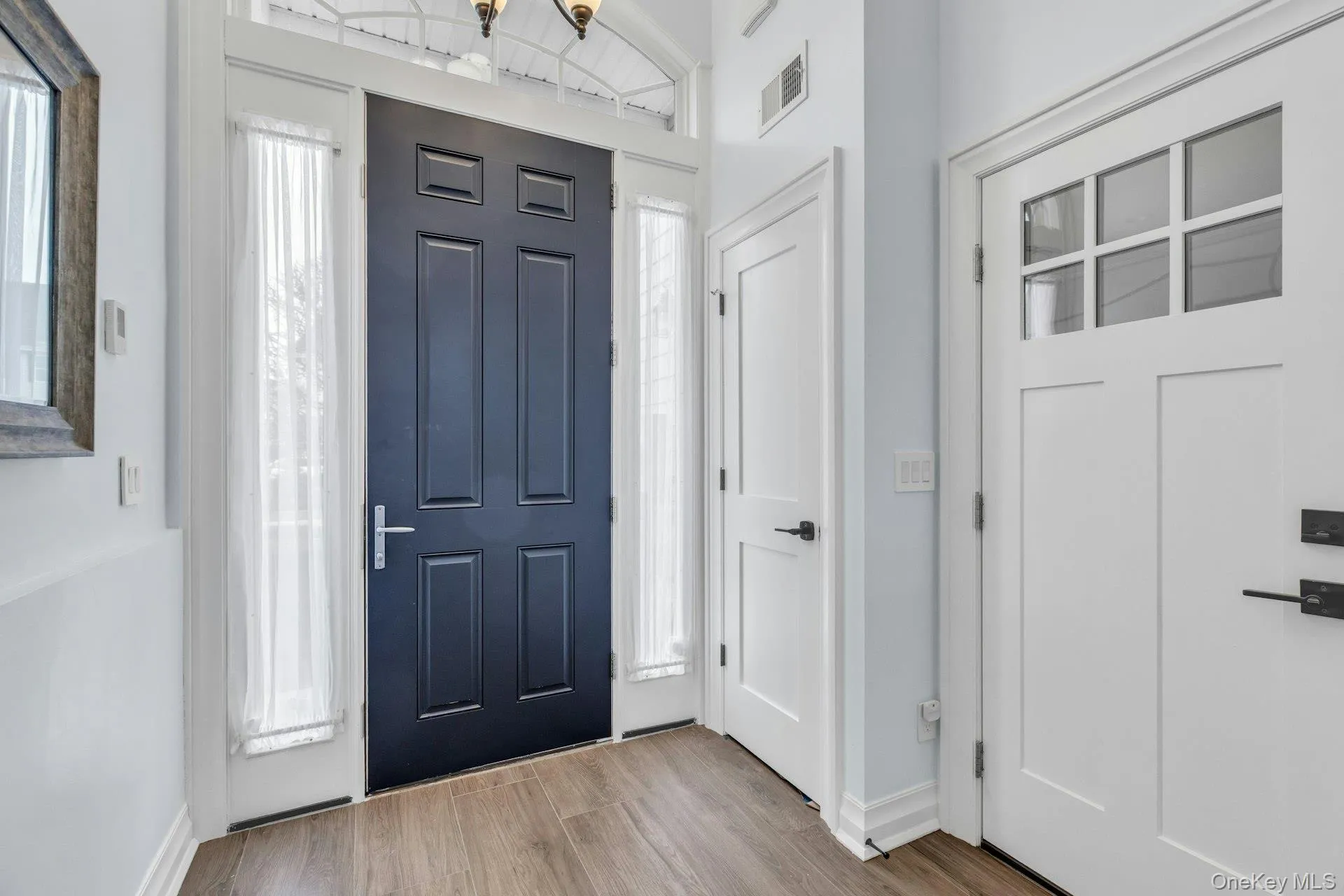 Entry Foyer with Radiant Heated Flooring and Interior Access to Garage. Entry Foyer with Radiant Heated Flooring and Interior Access to Garage.