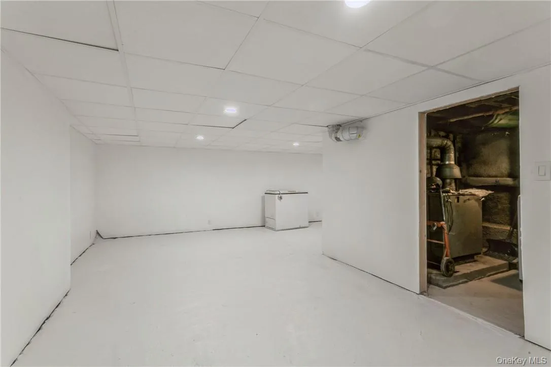 Basement and Boiler, hot water heater area Basement and Boiler, hot water heater area