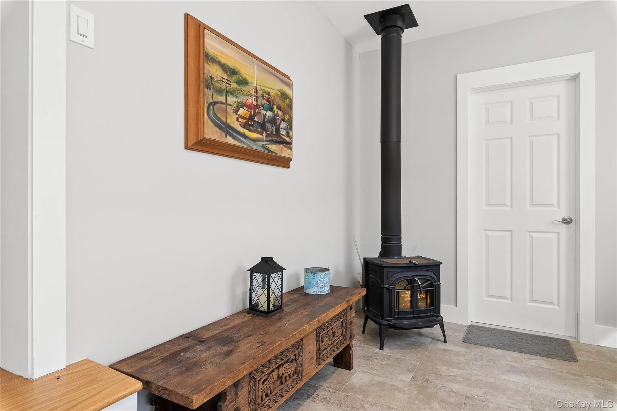 Cozy Sitting Room with Free-Standing Wood Burning Stove