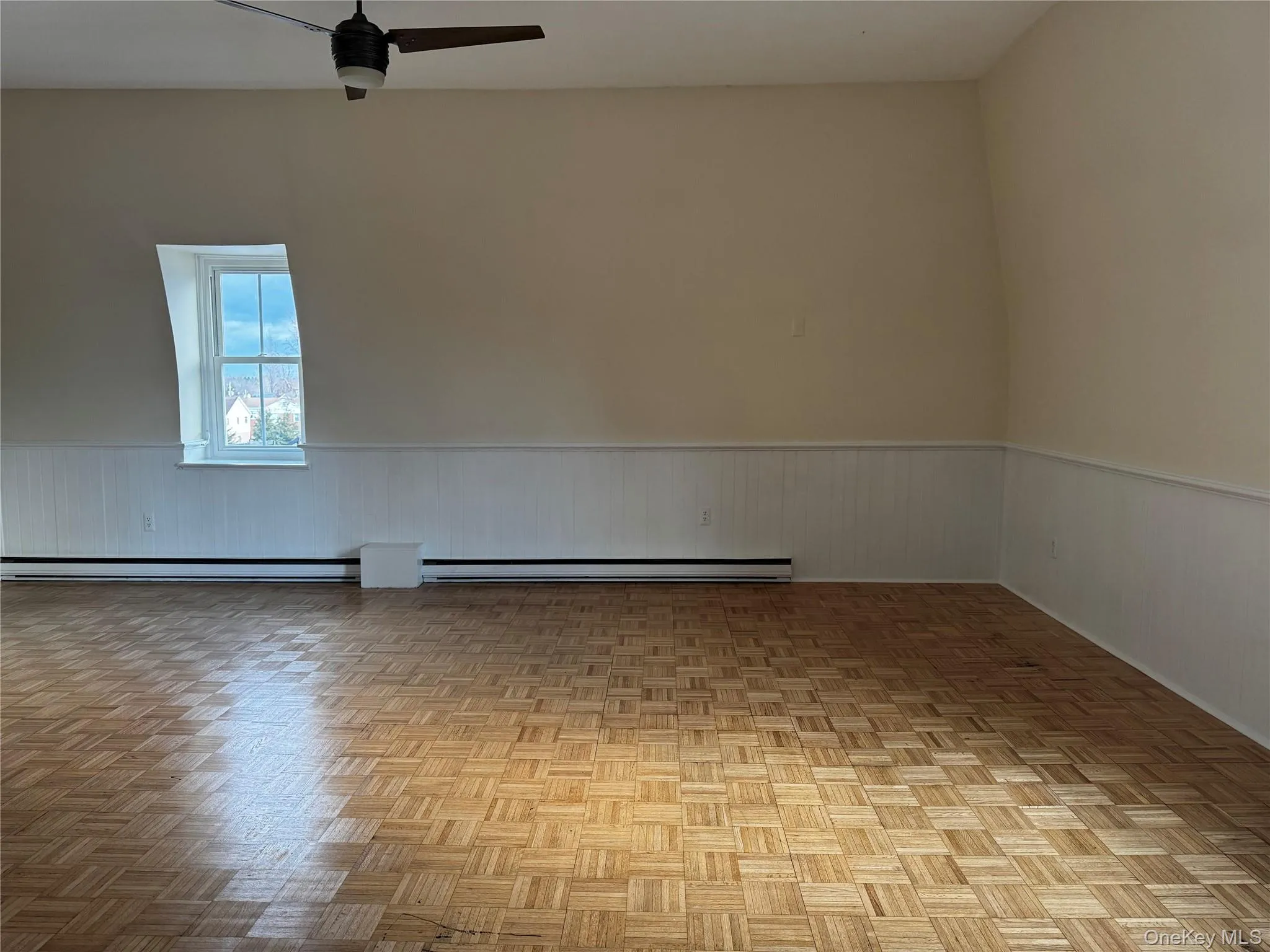 Spacious living room & lovely wood floors throughout Spacious living room & lovely wood floors throughout