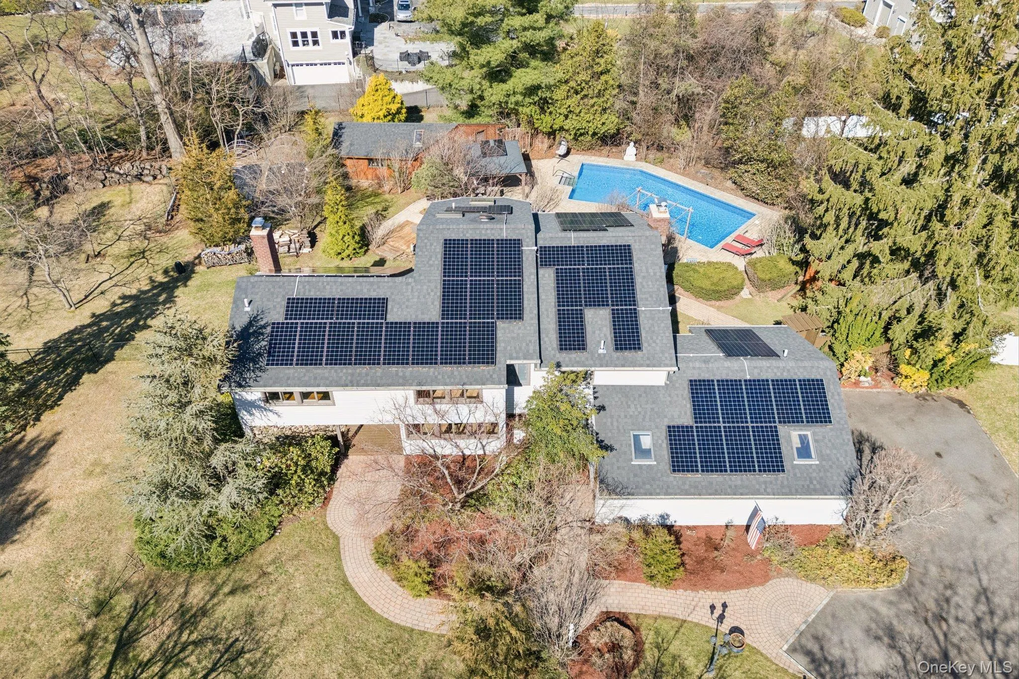 a spacious house with a ton of owned solar panels a spacious house with a ton of owned solar panels
