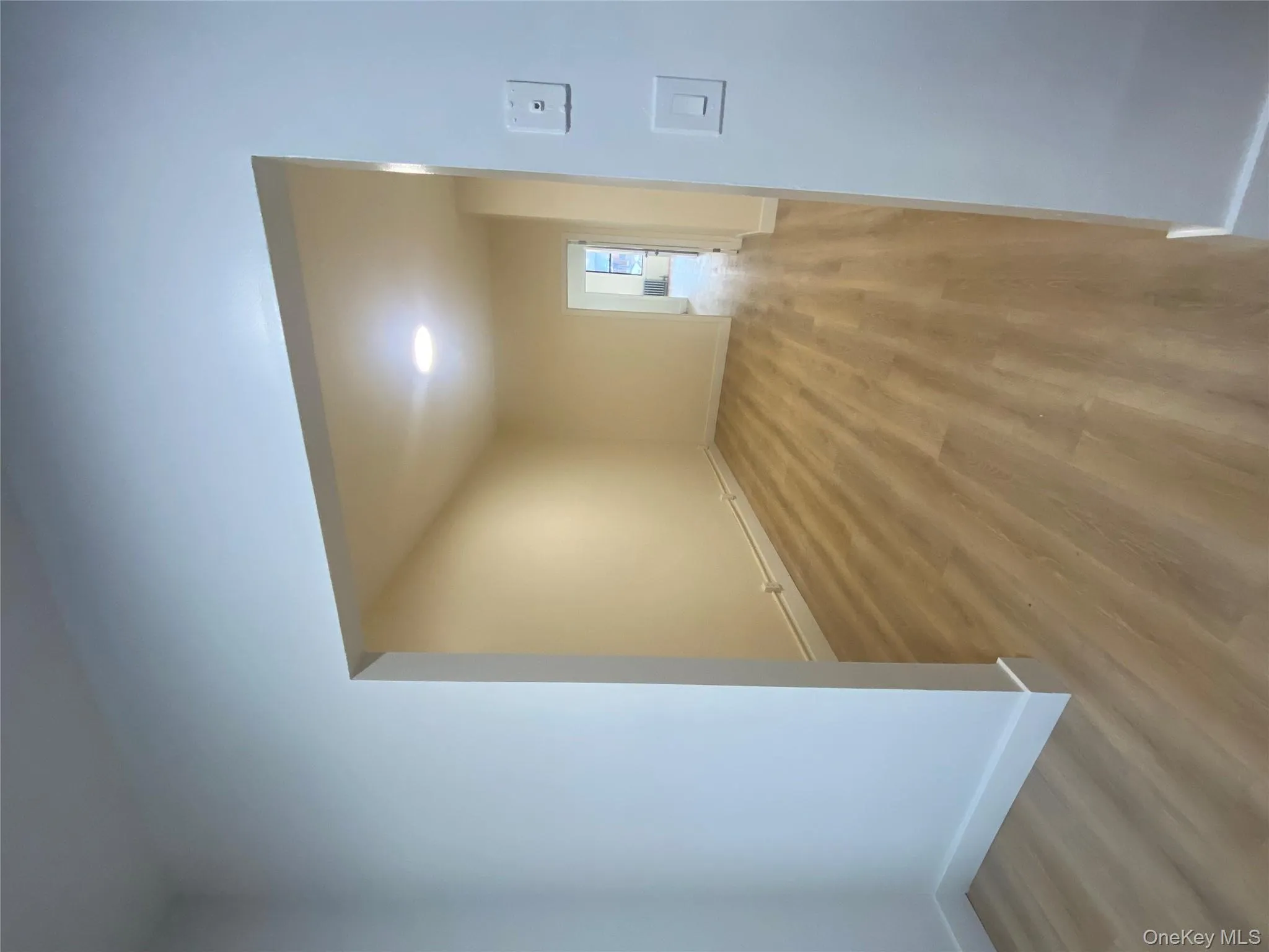 Empty room featuring light wood finished floors and baseboards Empty room featuring light wood finished floors and baseboards