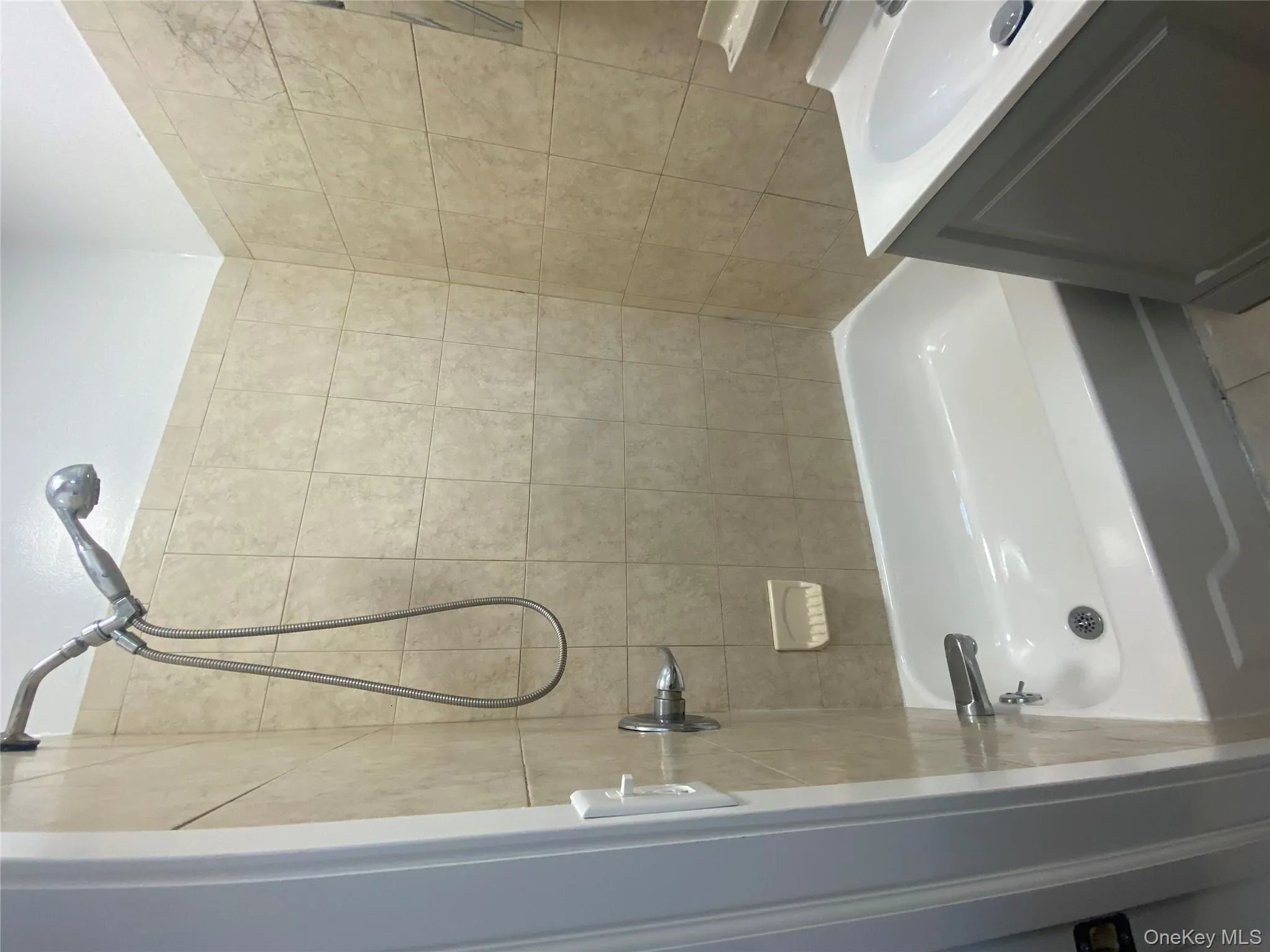 Bathroom with shower / bathtub combination and vanity Bathroom with shower / bathtub combination and vanity