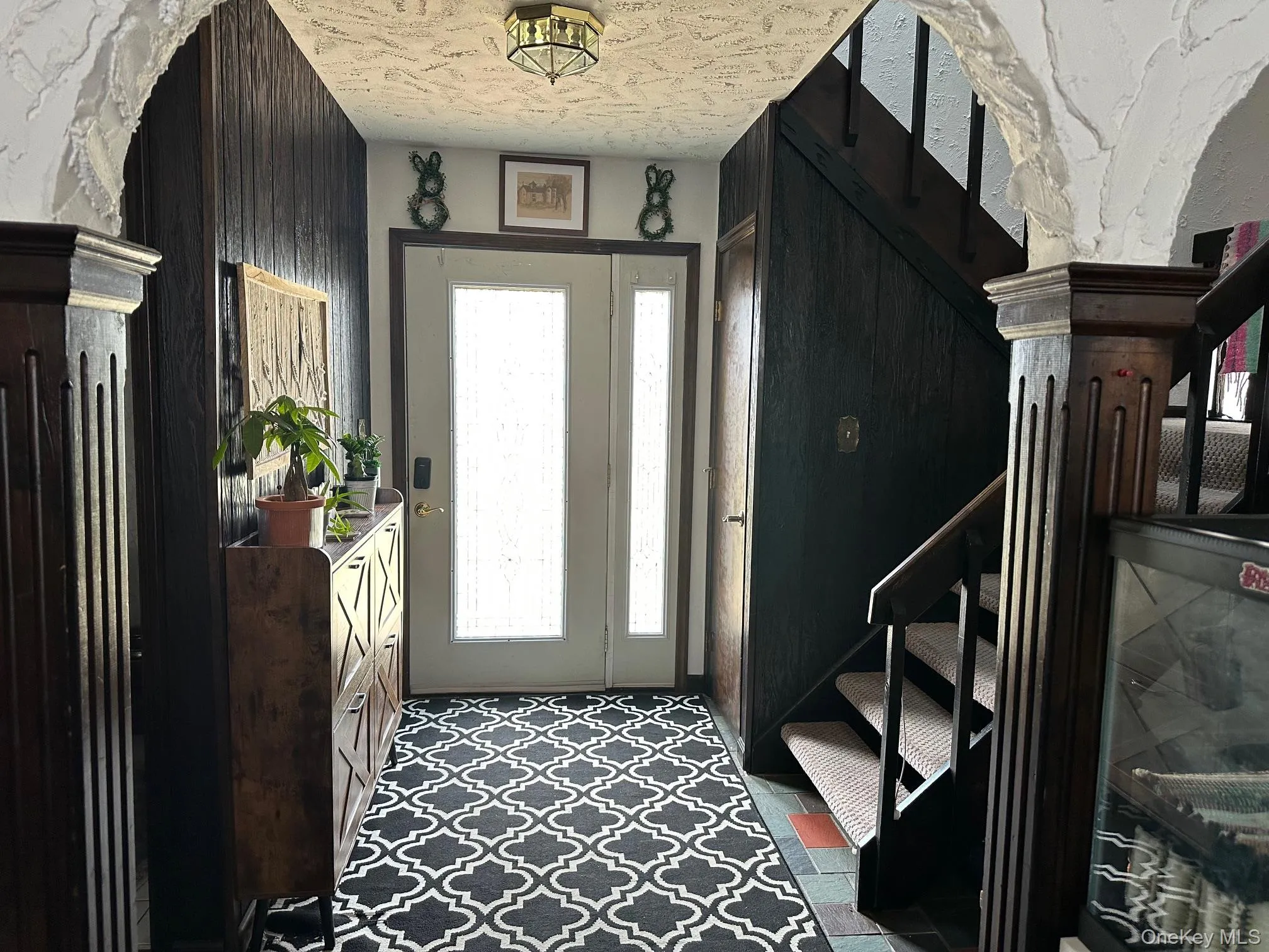 Entryway with stairway Entryway with stairway