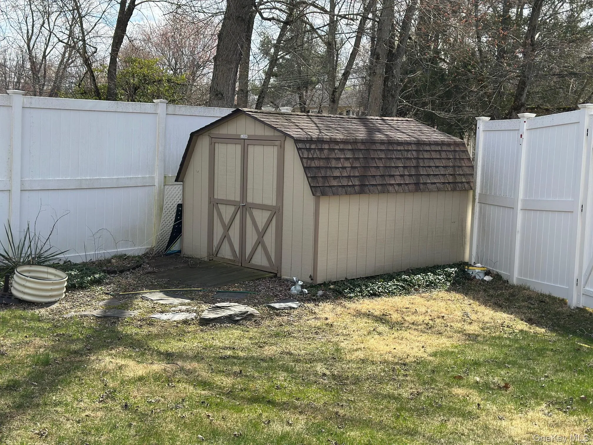 View of shed with a fenced backyard View of shed with a fenced backyard
