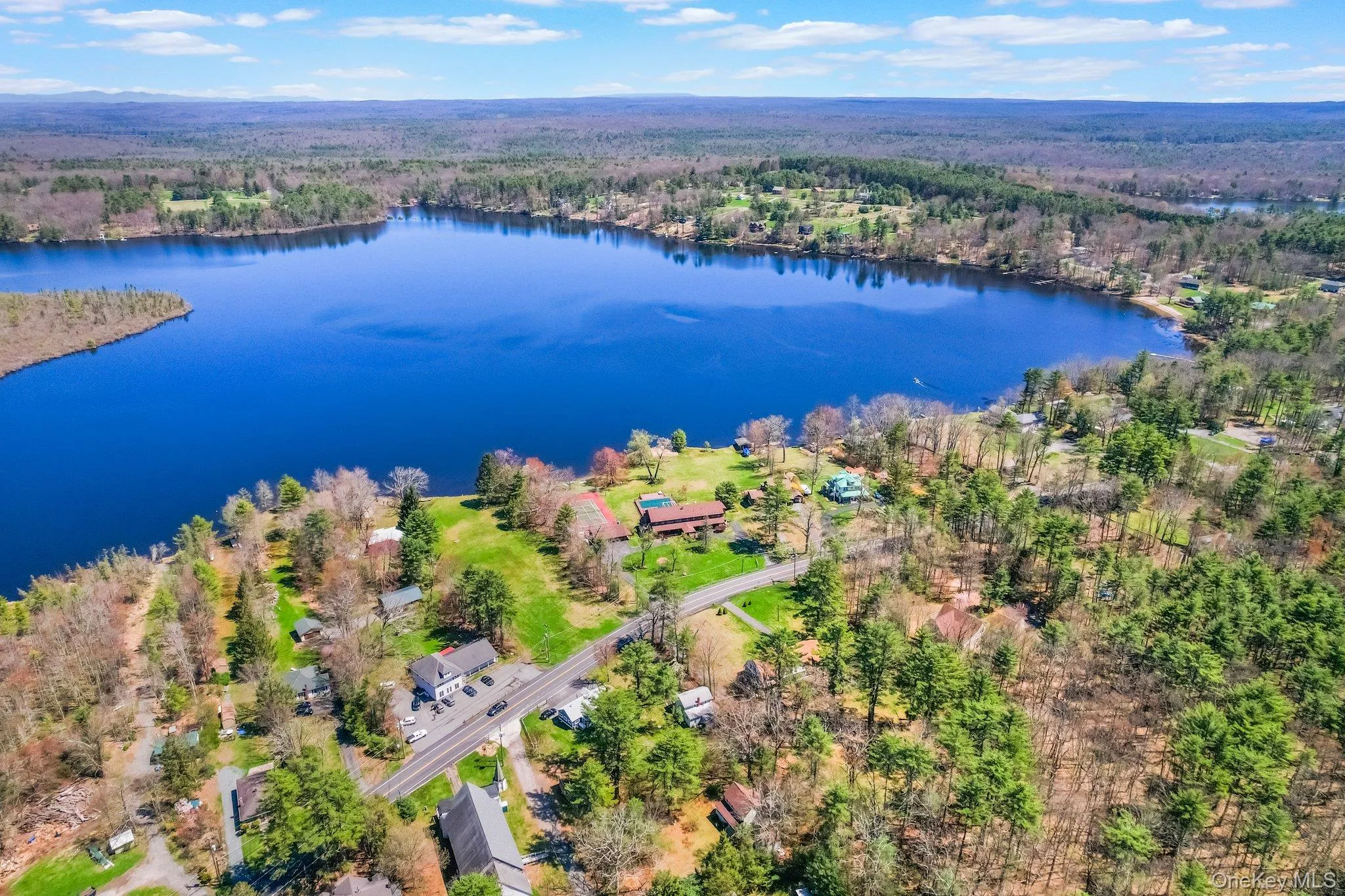 Bird's eye view with a water view of Highland Lake Bird's eye view with a water view of Highland Lake
